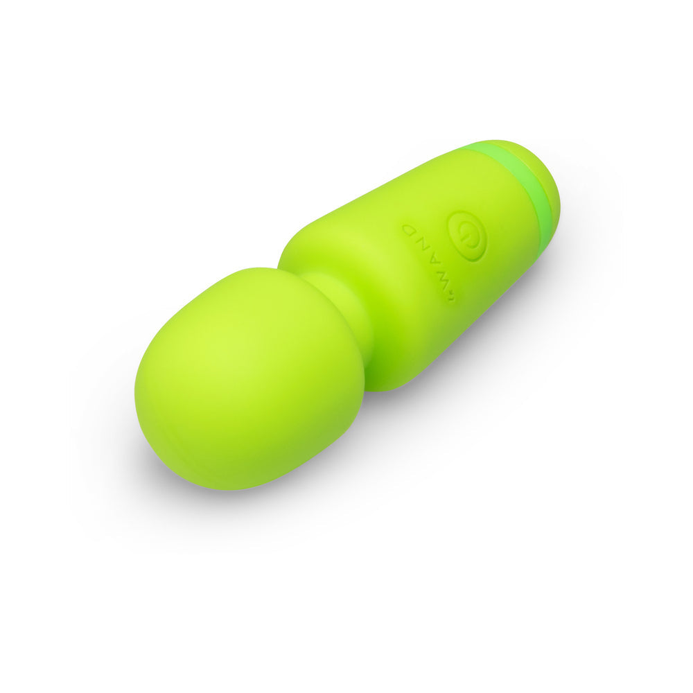 Le Wand Essentials Mini Wand Vibe Pocket-sized Vibrator in vibrant green color.