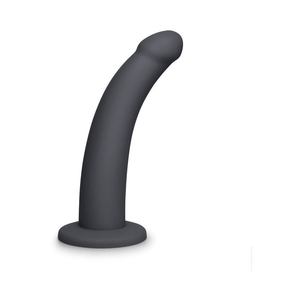 B-Vibe Essentials 7 Inch Smooth Silicone Dildo Black with a sleek design and smooth finish.