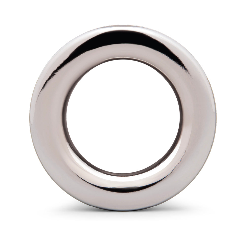 B-vibe Essentials 3 Inch Aluminum Hollow Tunnel Butt Plug with a sleek, shiny finish and hollow center.