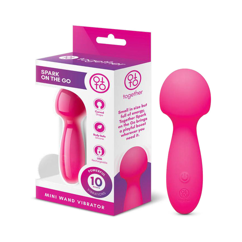 Together Spark On The Go Mini Wand Vibrator with packaging demonstrating its compact design and 10 powerful vibrations.