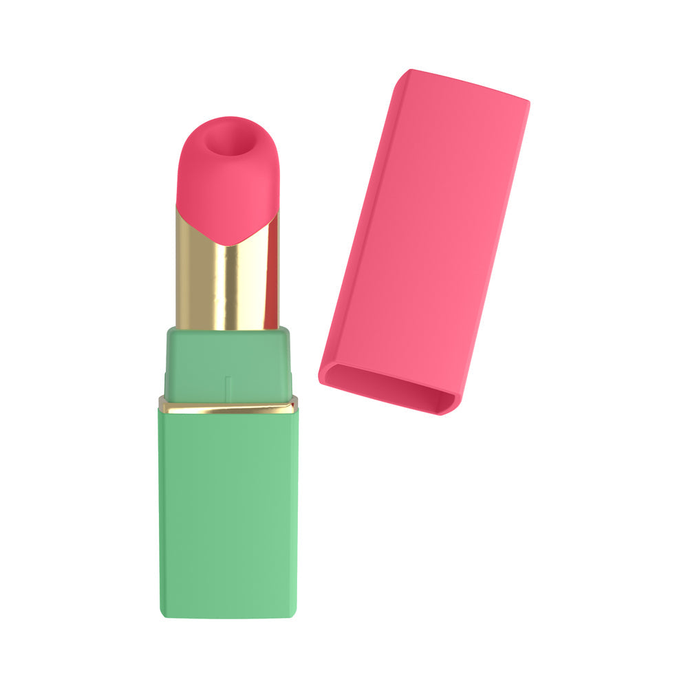 Womanizer Beauty Clitoral Stimulator Green Pink in a lipstick design, offering discreet pleasure on-the-go.