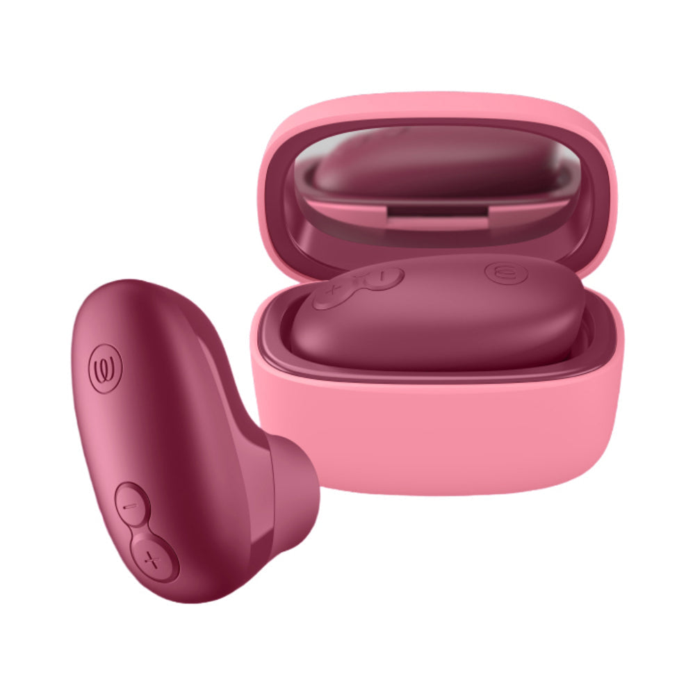 Womanizer Snap Clitoral Stimulator Crushed Berry in a hygienic charging case with mirror.