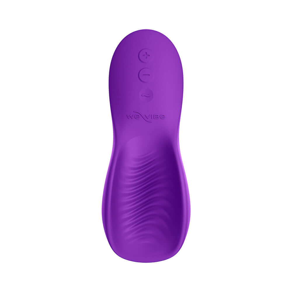 We-Vibe Shared Touch Couples Grinding Vibrator Purple featuring a textured stroker for dual stimulation.