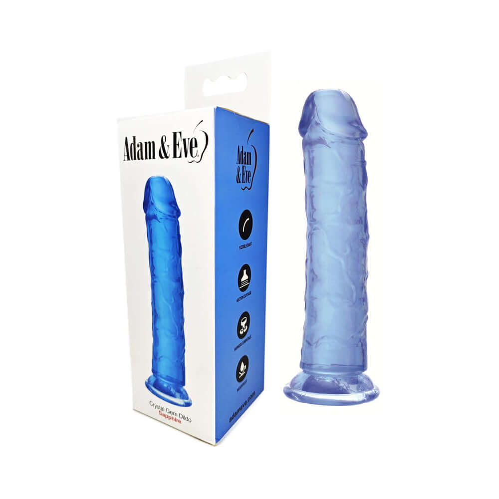 Adam & Eve Crystal Gem 7 Inch Dildo Sapphire displayed with packaging, showcasing its transparency and texture.