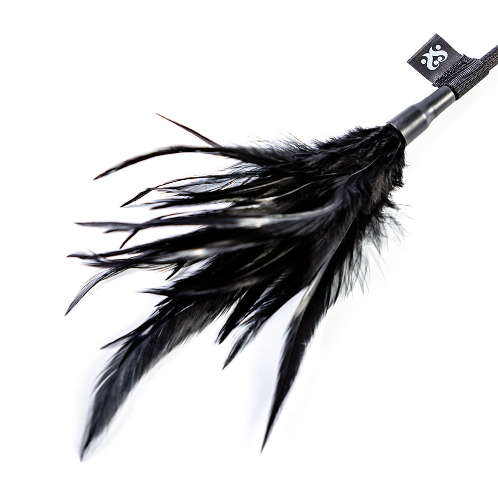 Sei Mio Double Standards Whip and Tickler with black feathers for versatile impact play.