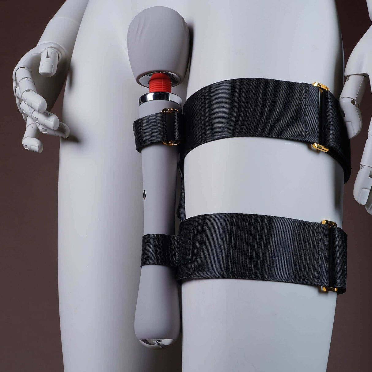 UPKO Remote-Control Wand Vibrator secured in thigh harness on a mannequin, showcasing innovative pleasure device.