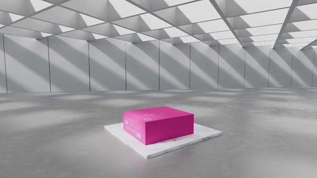 Lovense Spinel Thrusting Vibrating Dildo in pink packaging displayed in a modern, well-lit environment.