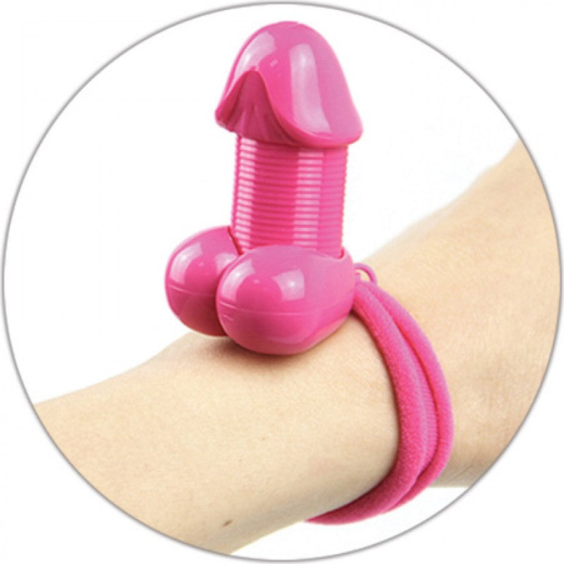 Hott Products Pecker Lastick Hair Tie Pink on a wrist, perfect for bachelorette parties and fun accessories.
