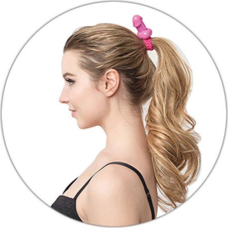Hott Products Pecker Lastick Hair Tie Pink in a ponytail, perfect for bachelorette parties and playful accessories.