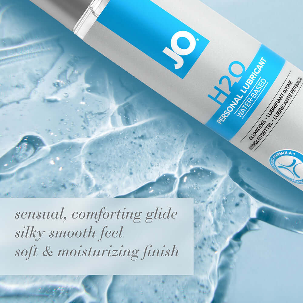 JO H2O Original Water-Based Lubricant 1 Oz on a smooth blue surface, highlighting its silky glide and moisturizing finish.