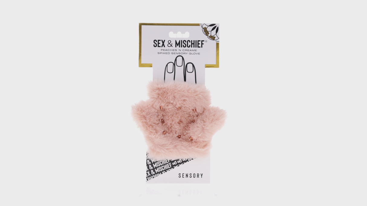 Sportsheets Sex & Mischief Peaches n CreaMe Spiked Sensory Glove packaging with soft pink texture.
