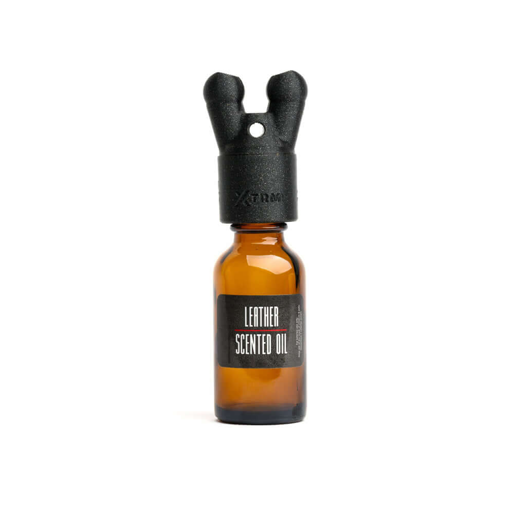 Xtrm Snffr 2.0 Leakproof Double Small Red with leather scented oil bottle and unique nose design.