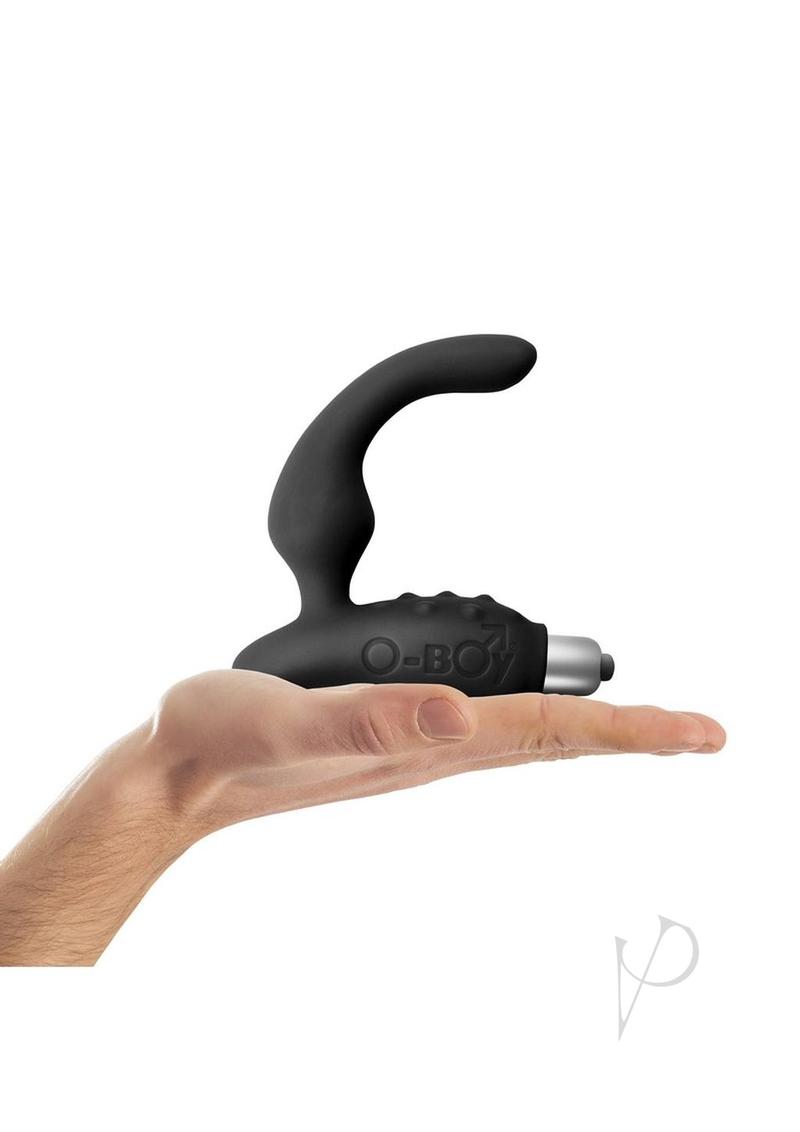 O Boy Silicone Prostate and Perineum Stimulator Black in hand showing its ergonomic design and sleek appearance.