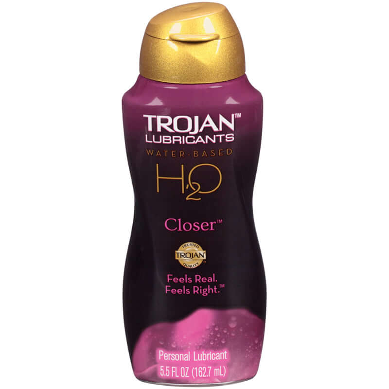 Trojan Lubricants H2O Closer 5.5 Oz personal lubricant bottle with gold cap and purple design.