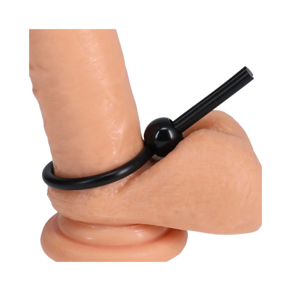 Rock Solid The Lasso Single Lock Adjustable Silicone Cock Tie Black on a realistic model for demonstration.