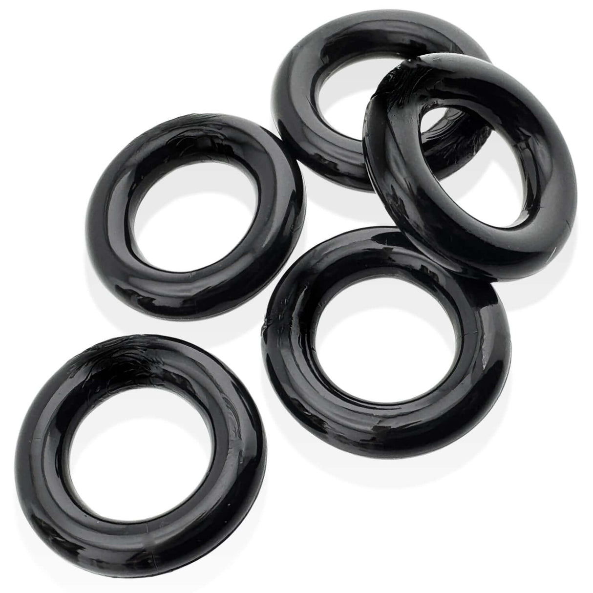 Oxballs Jacker 5-Stack Five-Pack Tube Super-Strong Cockrings Black in a set of five rubbery black cockrings.