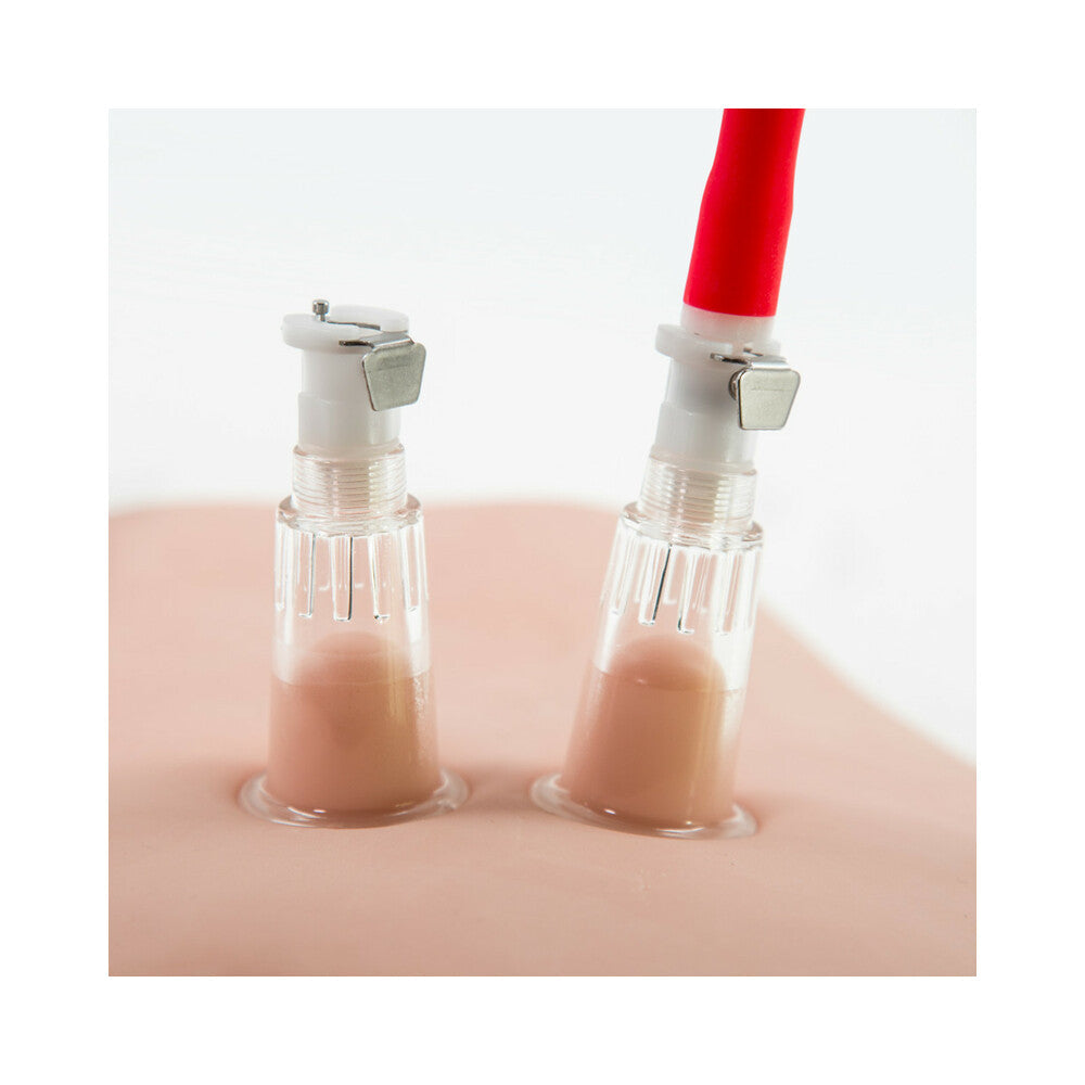 Blush Temptasia Beginners Clitoral Pumping System Black suction cups on a skin-like surface.