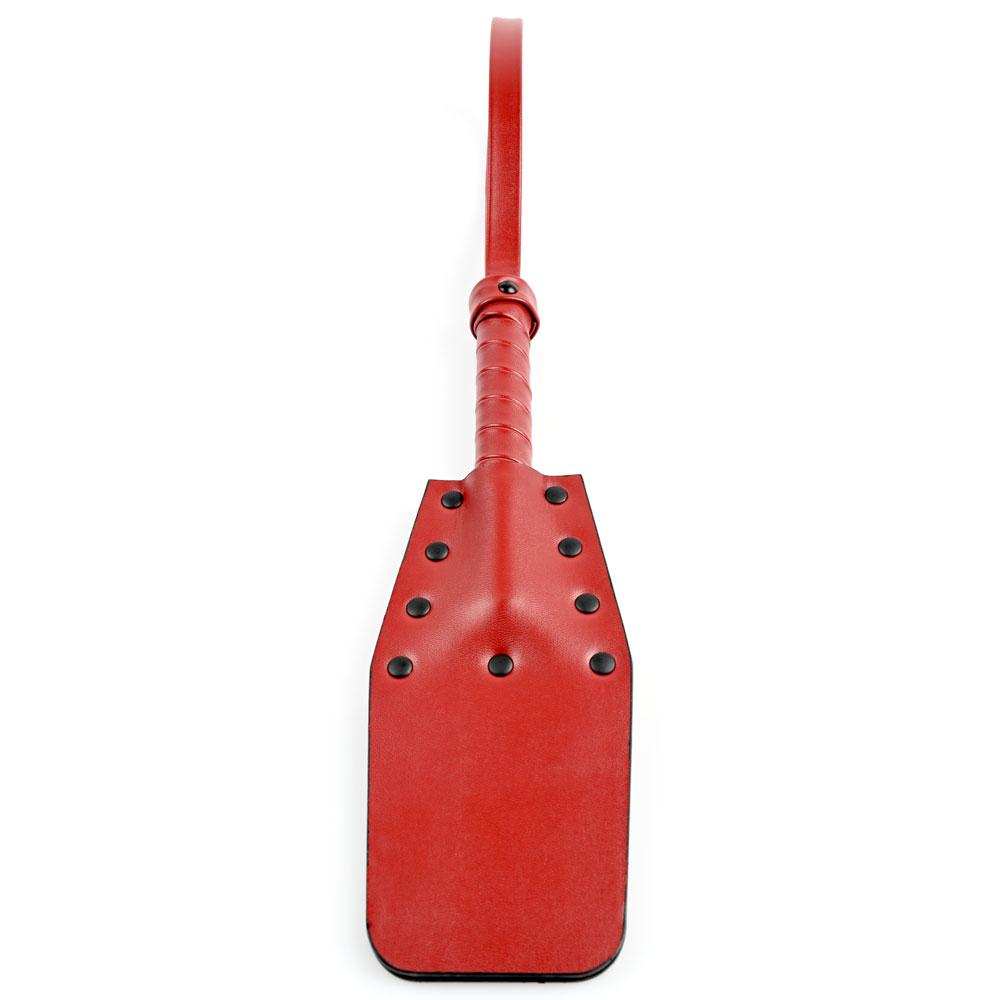Sportsheets Saffron Studded Spanker in vibrant red, designed for impact play and sensation exploration.