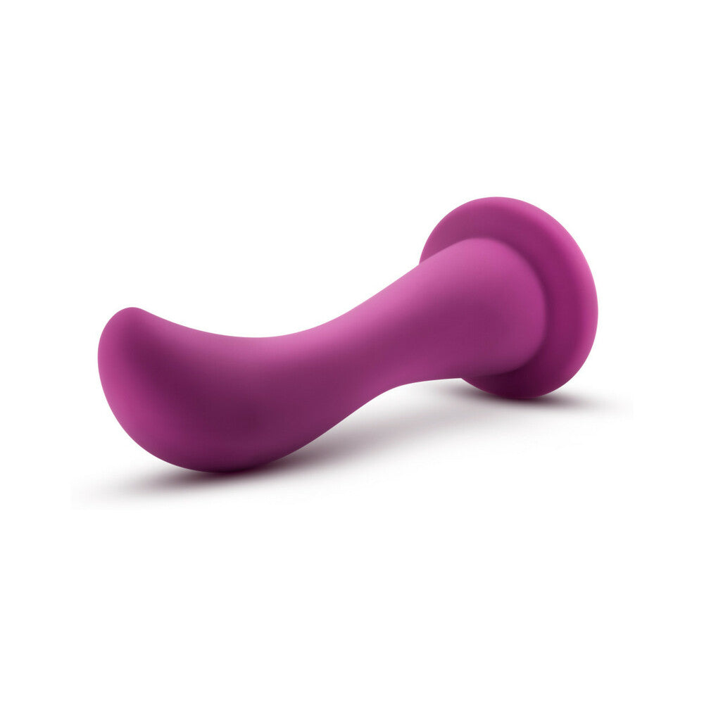 Blush Temptasia Bellatrix 6.25 inches Curved Dildo Plum showing an ergonomic design with a smooth, elegant curve.