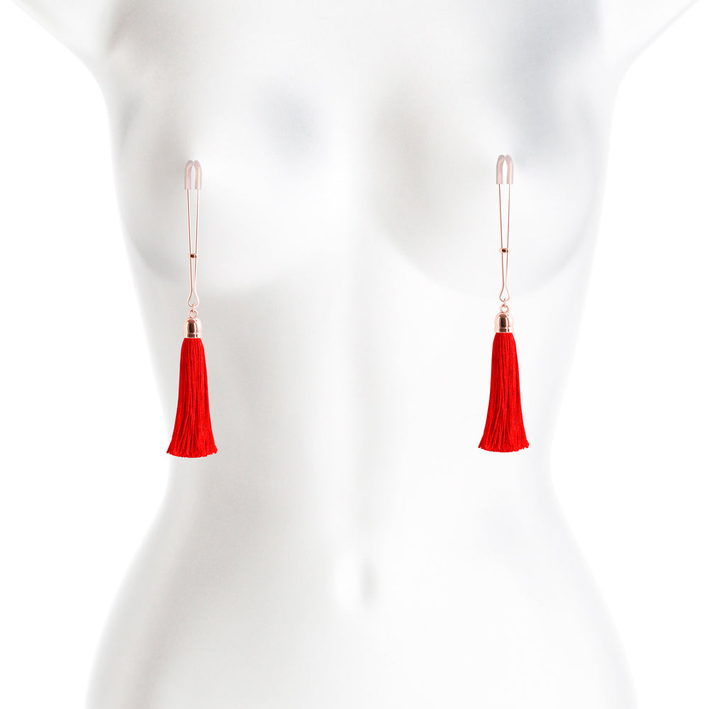 Bound Adjustable Nipple Clamps T1 Red on a mannequin, featuring tassels for an erotic experience.