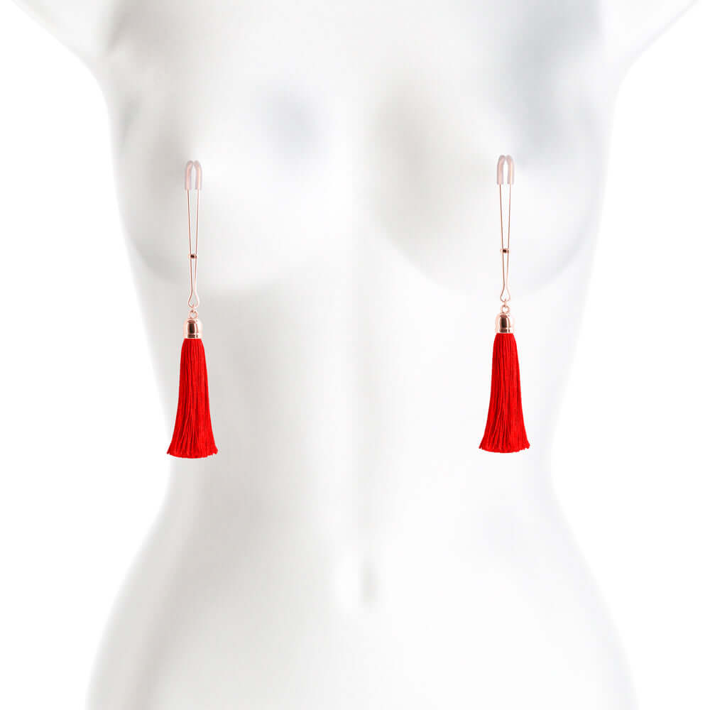 Bound Adjustable Nipple Clamps T1 Red on a mannequin, featuring tassels for an erotic experience.