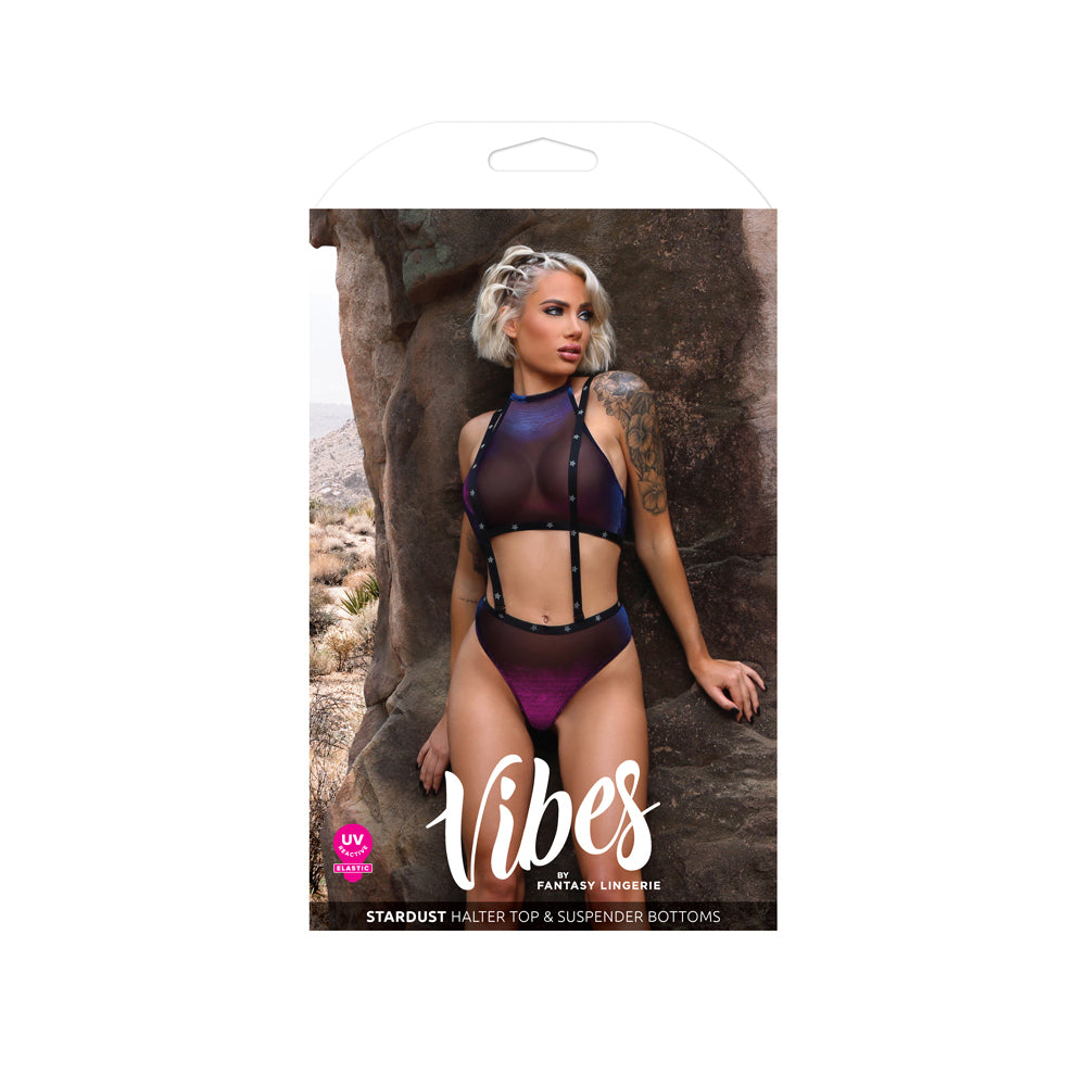 Stardust Halter Top & Suspender Bottoms M L displayed on a model amidst a natural background showcasing its UV-reactive design.