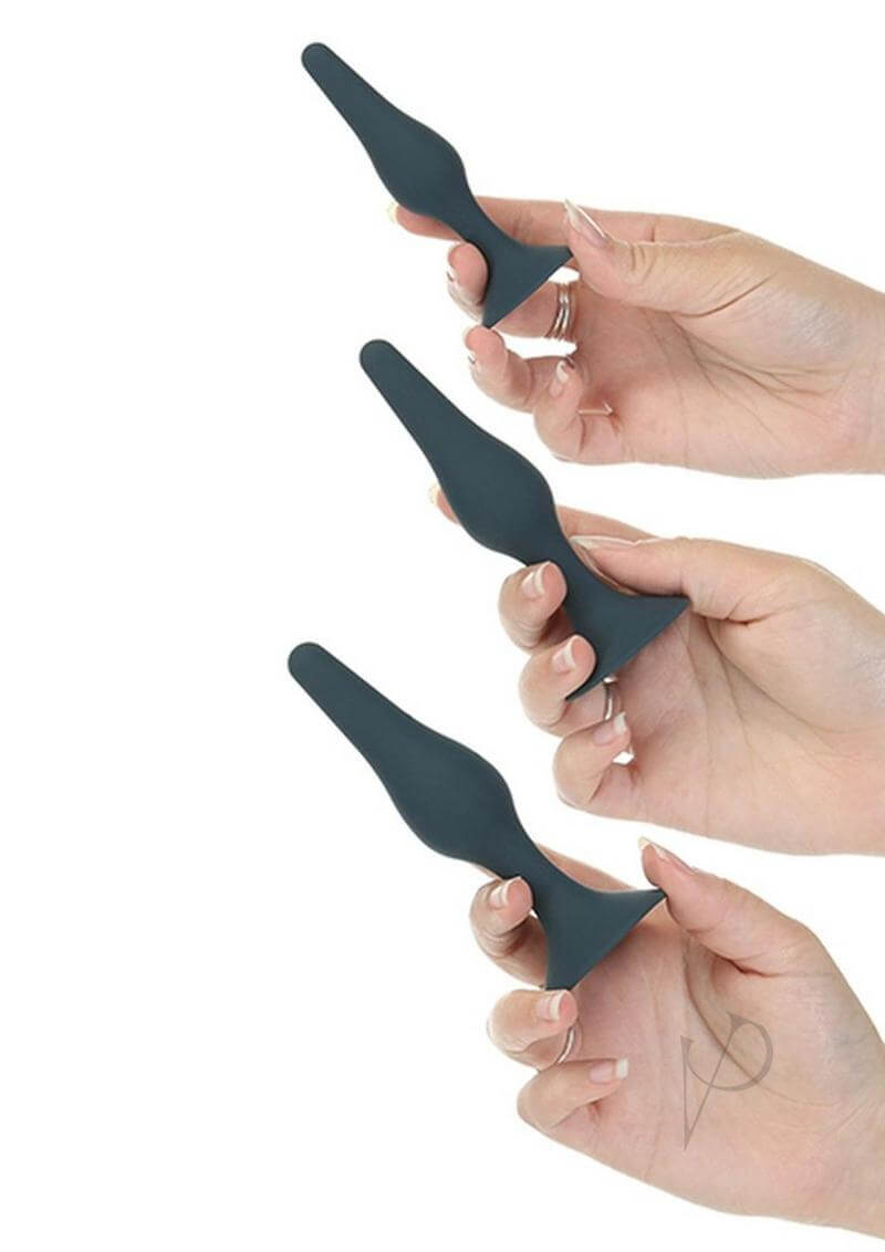 LUX Active Equip Anal Explorer Kit Blue with three silicone accessories held in hands