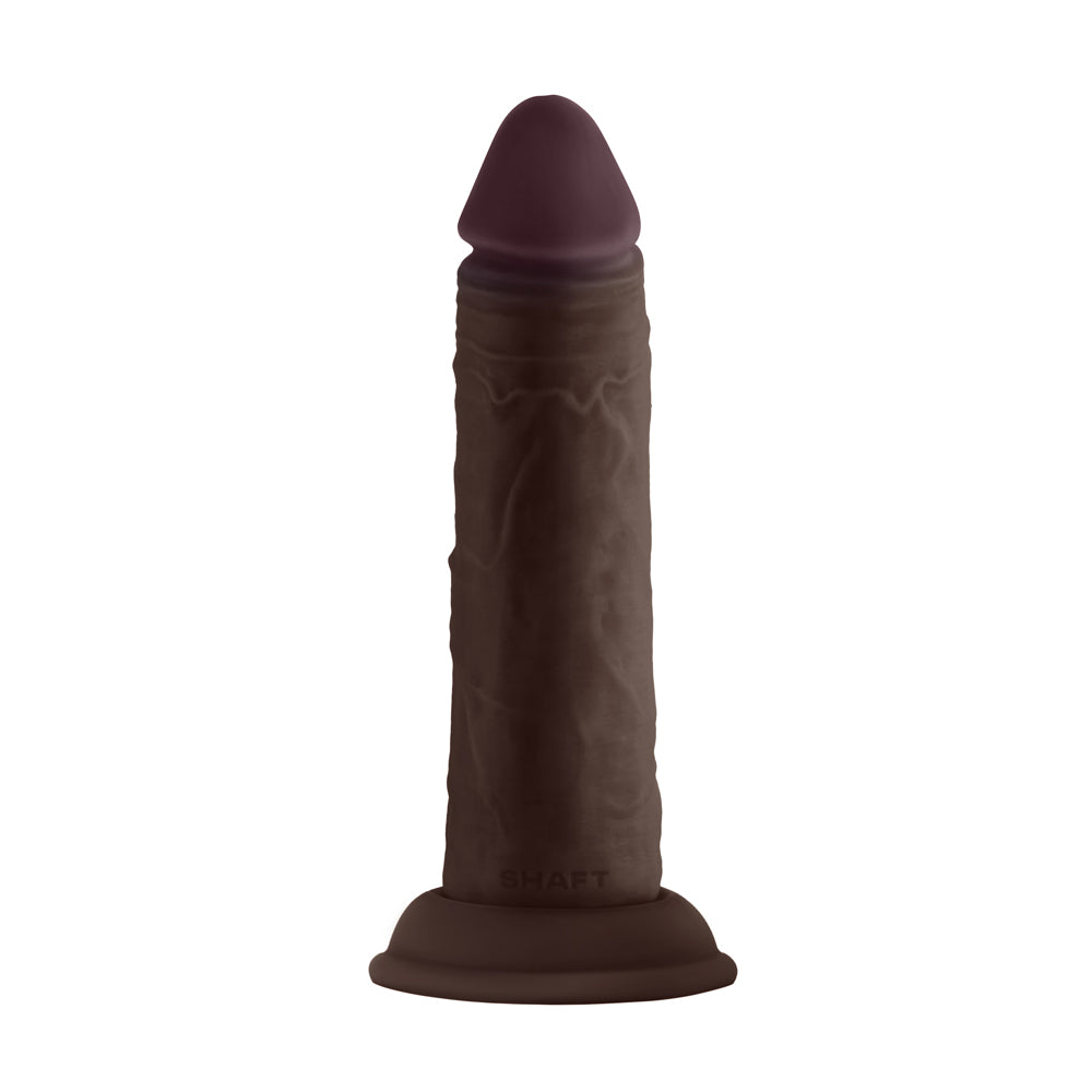 Shaft Model J 5.5 inch Liquid Silicone Dong Mahogany on a white background, showcasing its realistic design and texture.