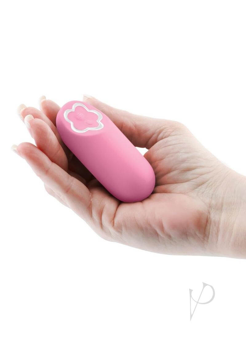 Sugar Pop Harmony Rechargeable Silicone Mini Vibrator Pink held in hand for discreet pleasure and easy travel.