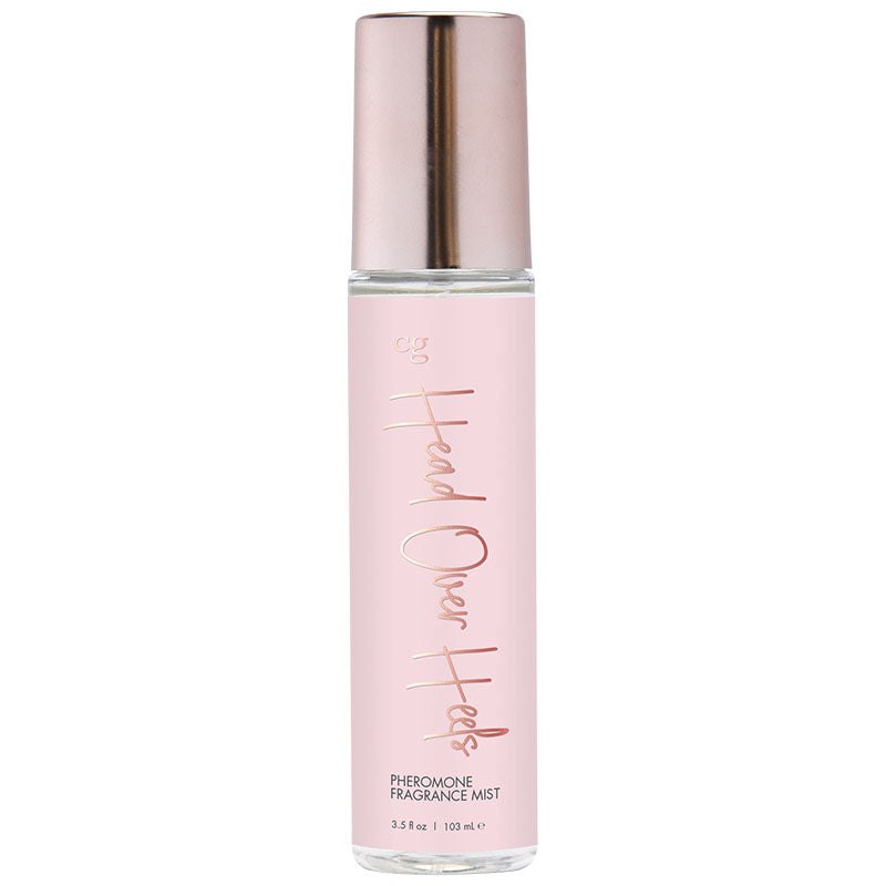 CG Body Mist with Pheromones Head Over Heels 3.5 Oz in a sleek bottle with a pink design and metallic cap.