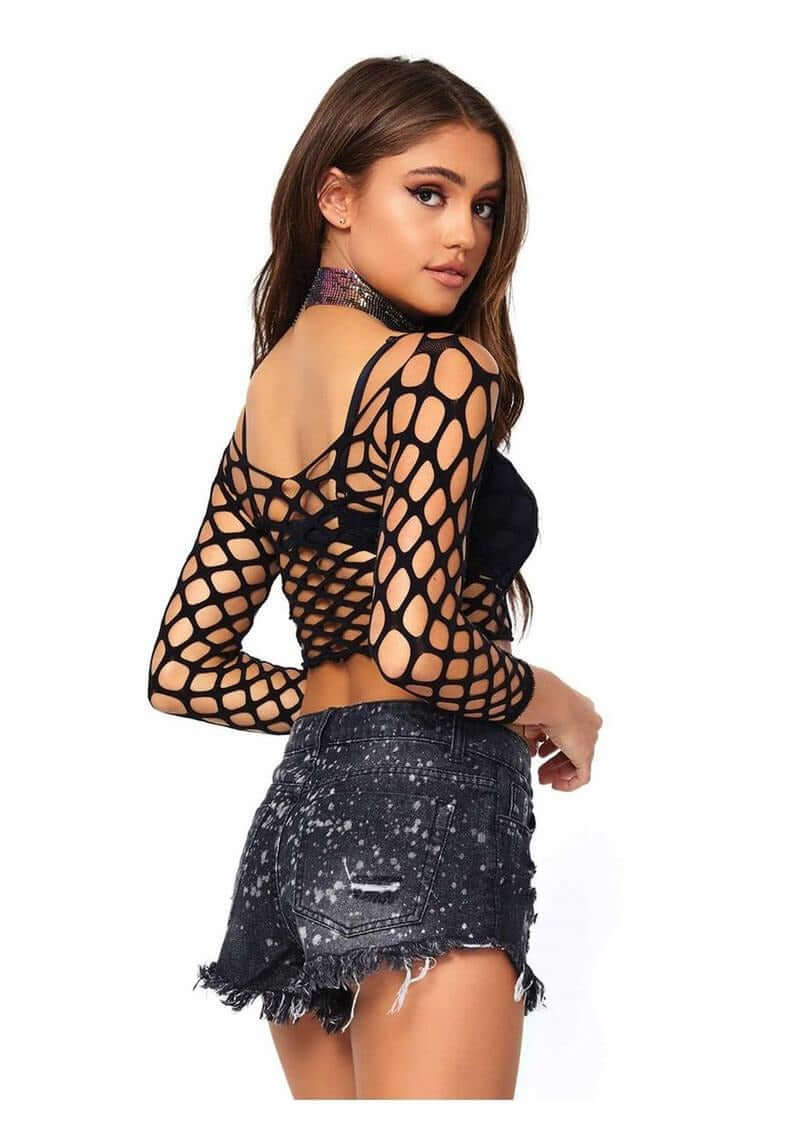 Leg Avenue Pothole Net Long Sleeved Crop Top OS Black worn with distressed shorts, showcasing edgy fashion style.