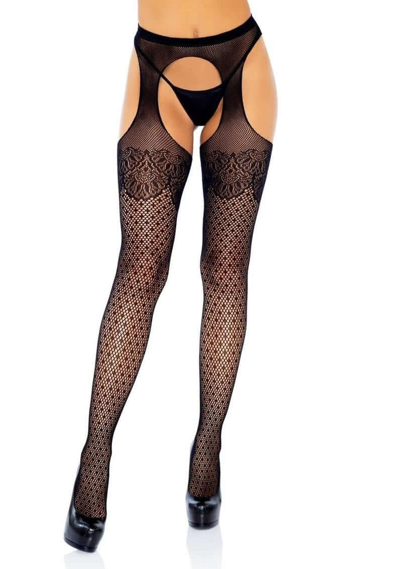Leg Avenue Polka Dot Fishnet Suspender Hose with Lace Top Black displayed on a model, showcasing intricate fishnet design.