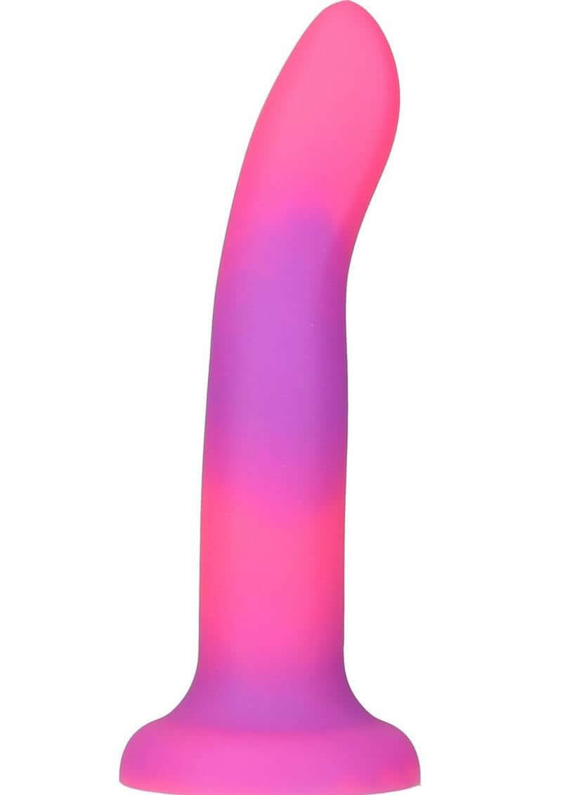 Addiction Rave Silicone Glow In The Dark Dildo 8 inch Pink Purple, featuring vibrant colors and a sleek design.