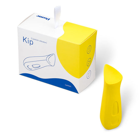 Dame Kip Rechargeable Silicone Clit Stimulator Lemon in a yellow box with a sleek design and ergonomic shape.