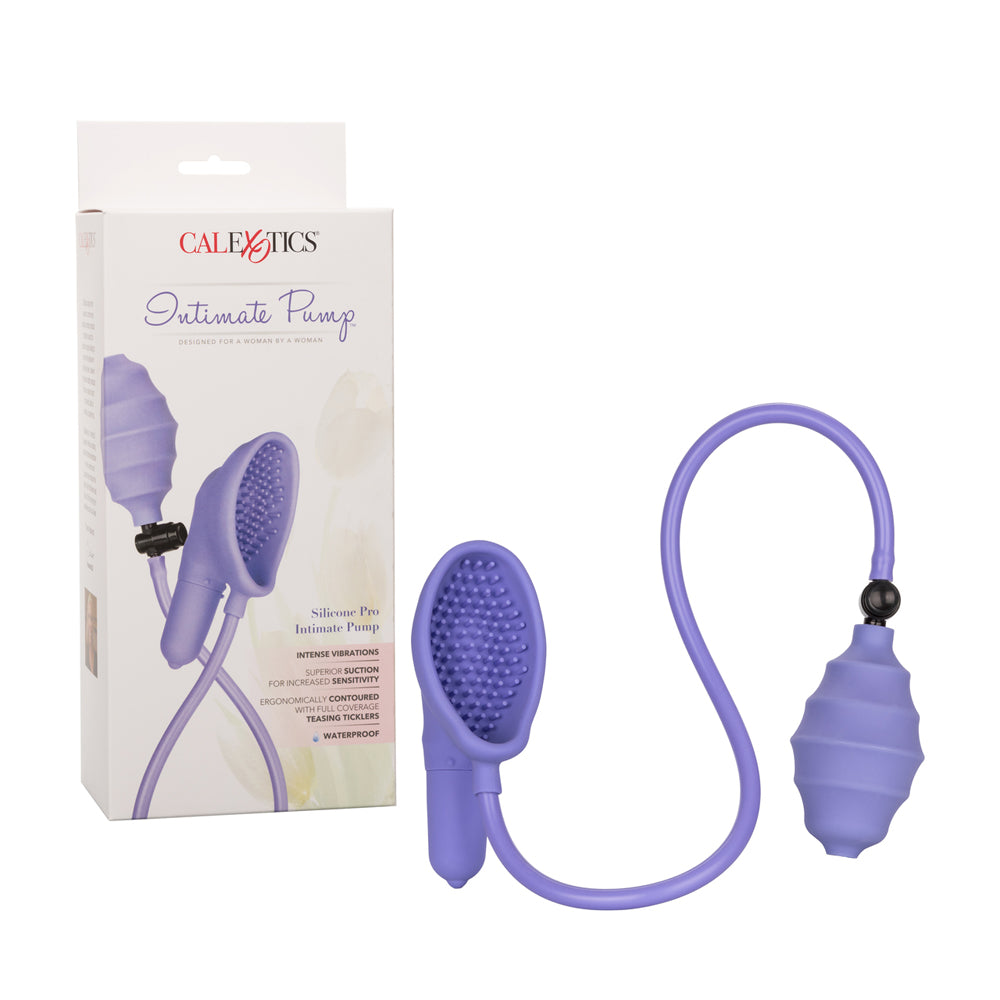 CalExotics Silicone Pro Vibrating Clit Pump Purple with suction cup and control for enhanced arousal.