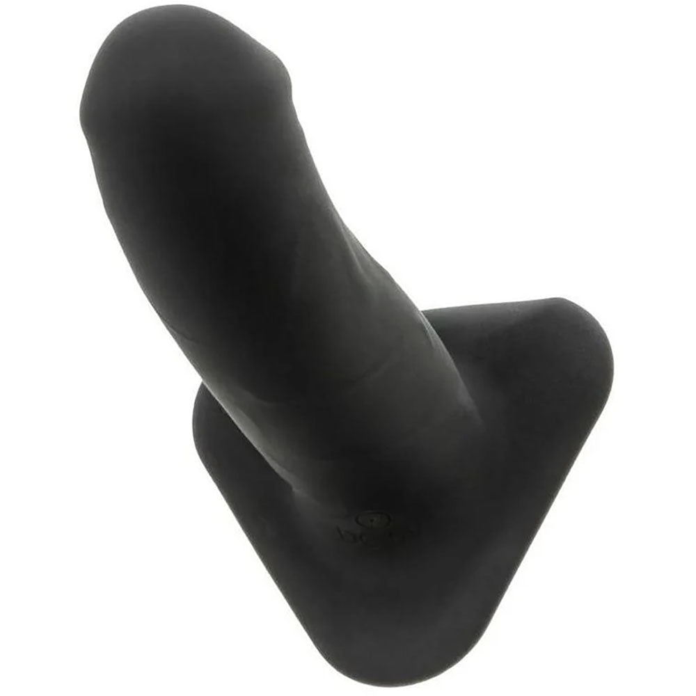 Onyxxx Silicone Beginner Stud Anal Vibrator Black positioned to show its sleek design and tapered shape.