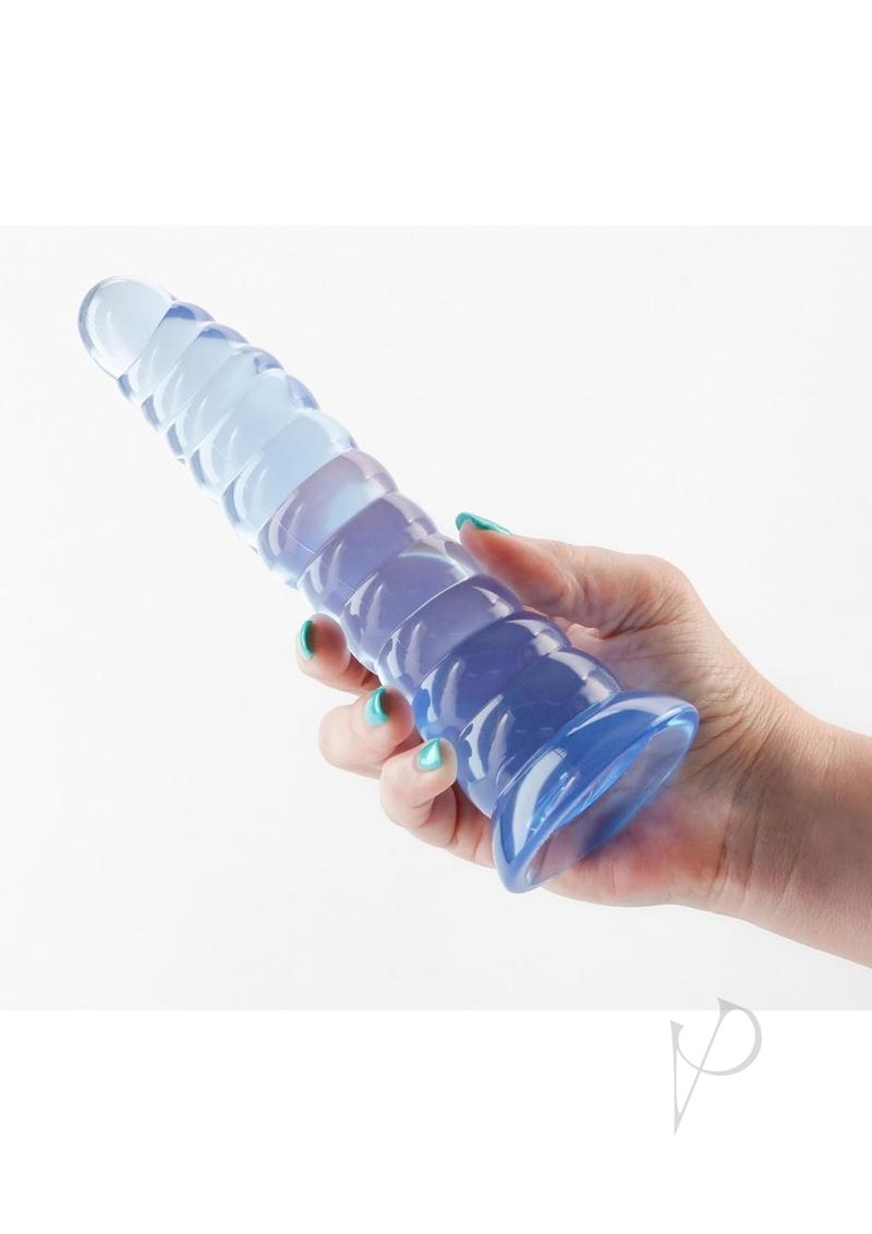 Fantasia Nymph Non-Phallic TPE Dildo Blue held in hand showcasing its flexible design and stylish blue finish.