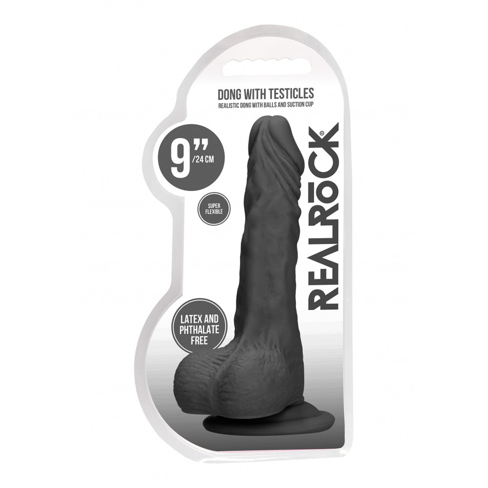 Realrock 9 Inch Dong With Testicles Realistic Black in packaging showcasing its design and features.