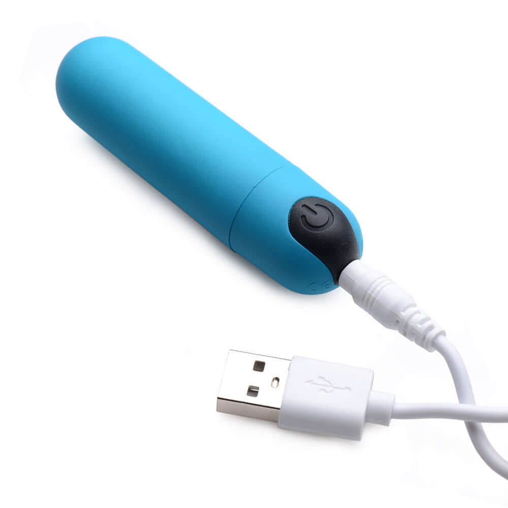 BANG Vibrating Bullet with Remote Control Blue charging via USB cable for powerful vibrations.