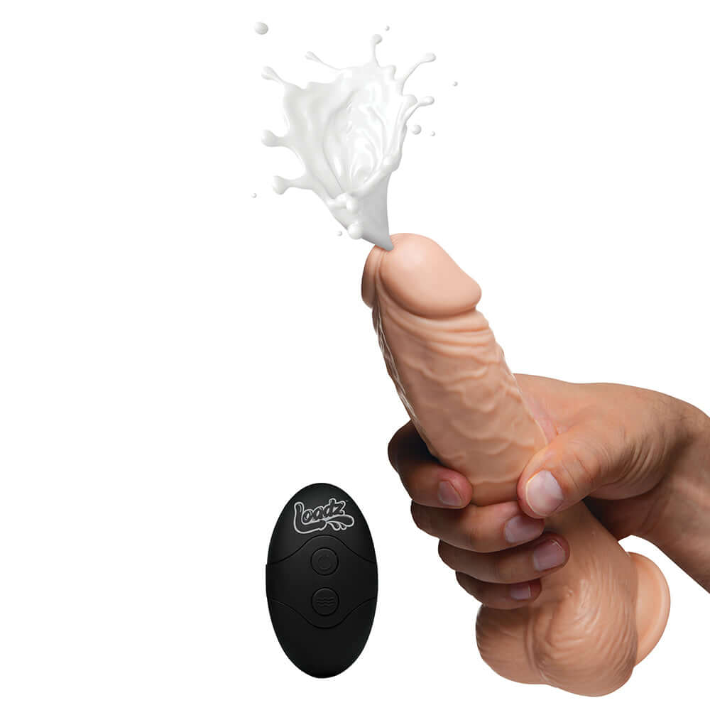 Loadz 7 inches Vibrating Squirting Dildo Light in use, showing liquid release and remote control.