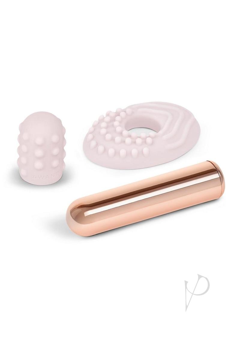 Le Wand Bullet Silicone Sleeve Vibrator Rose Gold with silicone accessories.