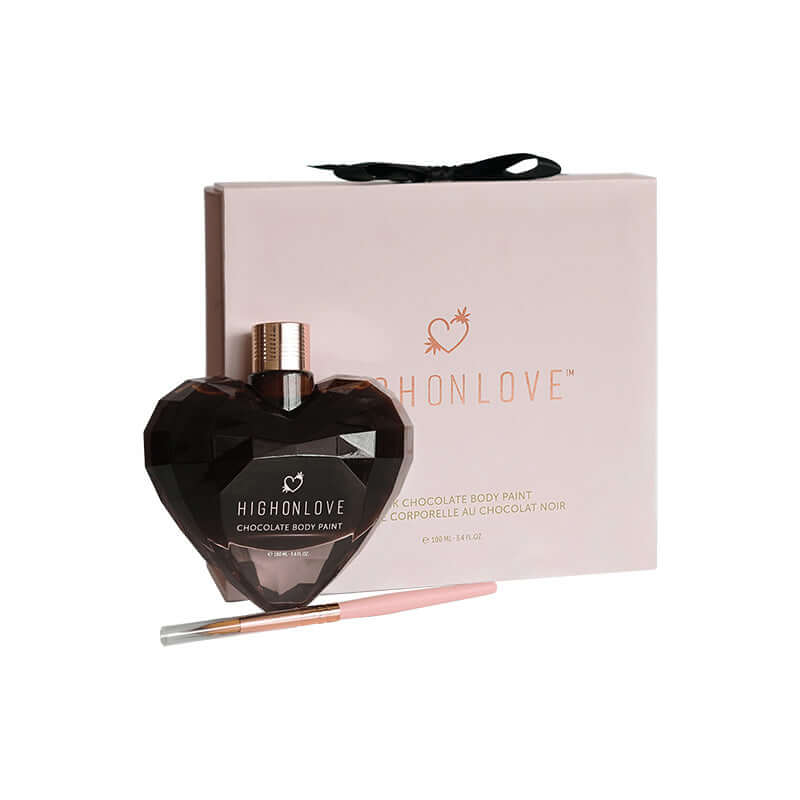 HighOnLove Dark Chocolate Body Paint bottle in heart shape with packaging and applicator brush.