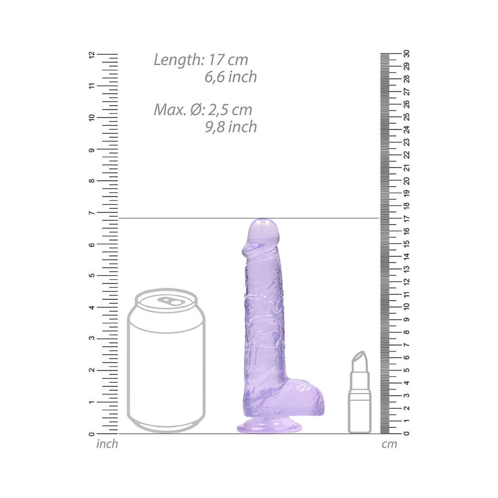 RealRock Crystal Clear Realistic 6 inch Dildo With Balls Purple next to a can for size comparison.