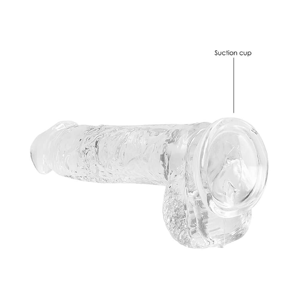 RealRock Crystal Clear Realistic 6 inch Dildo With Balls Clear showing suction cup detail.