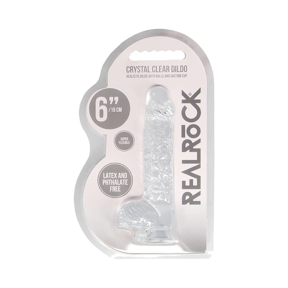 RealRock Crystal Clear Realistic 6 inch Dildo With Balls Clear in packaging, showcasing its transparent design and flexible structure.