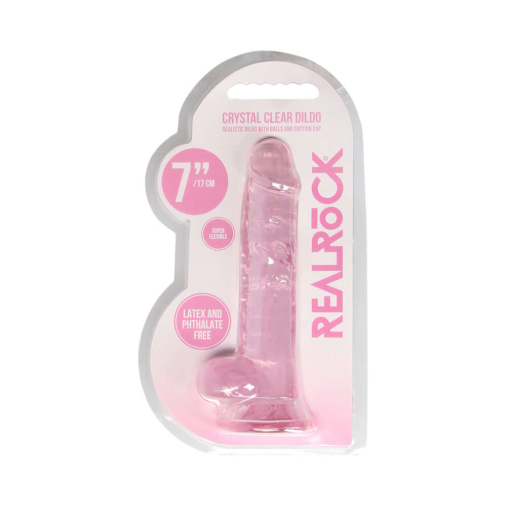 RealRock Crystal Clear Realistic 7 inch Dildo Pink in packaging with clear design and labeled features.