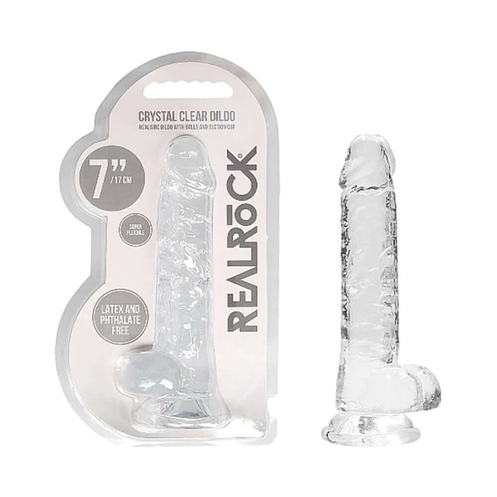 RealRock Crystal Realistic 7 inch Dildo Clear in packaging, displaying a lifelike design and sturdy suction cup base.