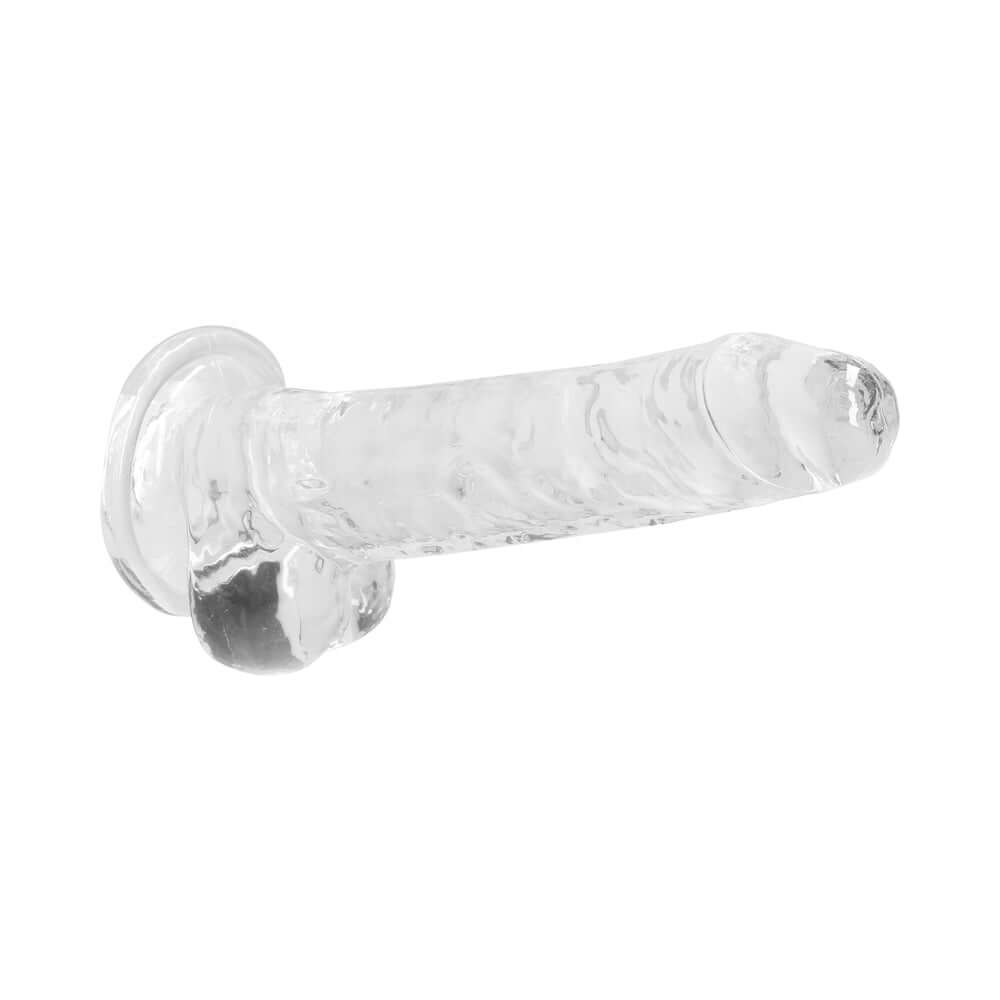 RealRock Crystal Realistic 7 inch Dildo Clear with a transparent design and suction cup base for hands-free play.