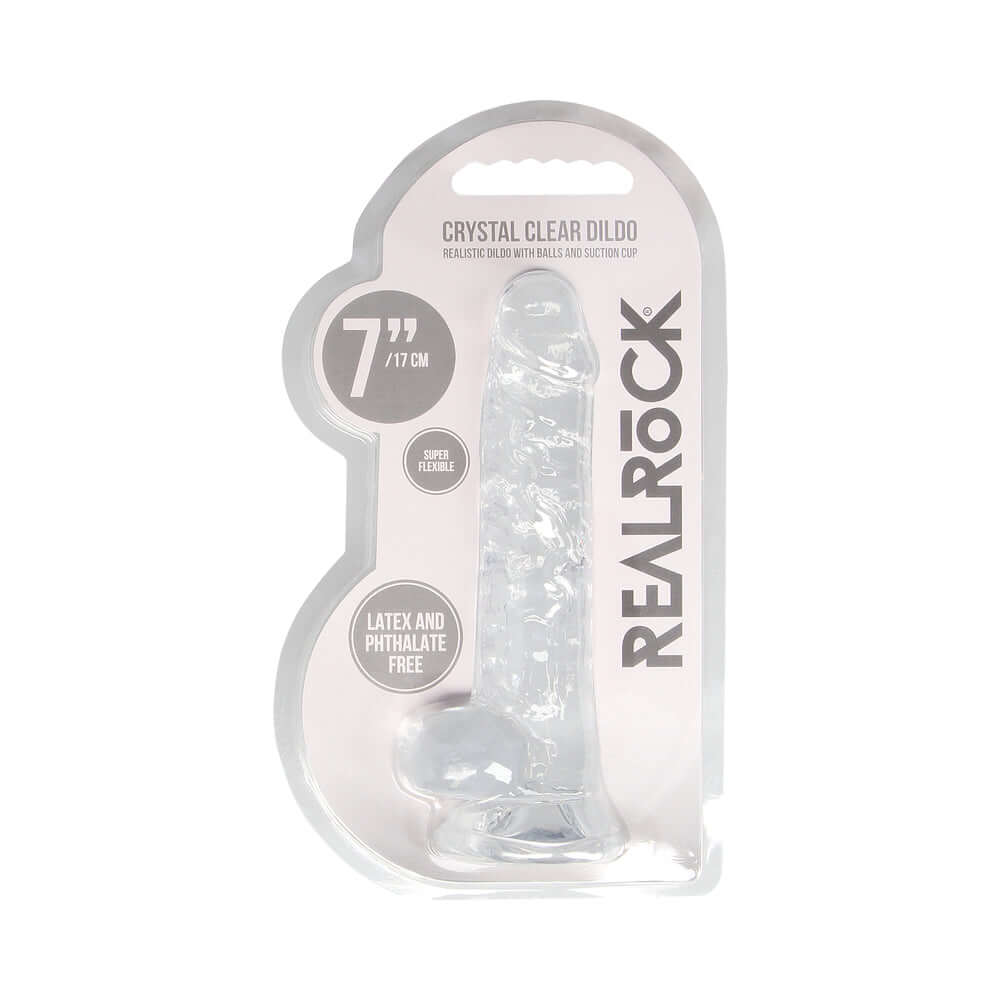 RealRock Crystal Realistic 7 inch Dildo Clear in packaging with clear design and suction cup base.
