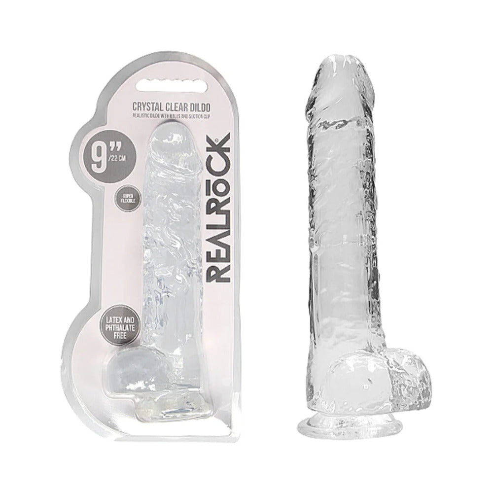 RealRock Crystal Clear Realistic 9 inch Dildo With Balls Clear in packaging and displayed, showing its crystal clear design.